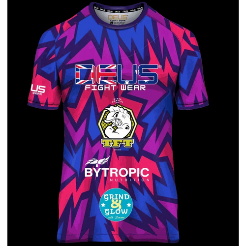 Deus Fight Wear Charles Joyner MMA walkout t-shirt with vibrant purple and pink geometric design, lightweight and moisture-wicking Polyester fabric.